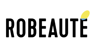 Testo nero "ROBEAUTE" tutto maiuscolo con un piccolo ovale giallo e una forma curva blu sopra la lettera "E" alla fine, che dà l'impressione di un segno di accento. Lo sfondo è bianco.