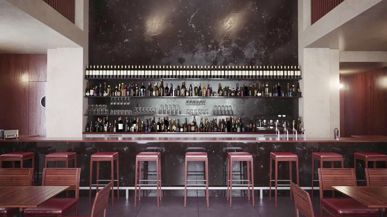 A modern bar with a dark marble back wall, shelves filled with bottles and glasses, a counter with red barstools, and wooden tables and chairs in the foreground. The space has a minimalistic, contemporary design.